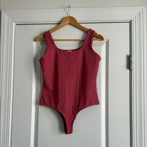 Elegant Pink Bodysuit